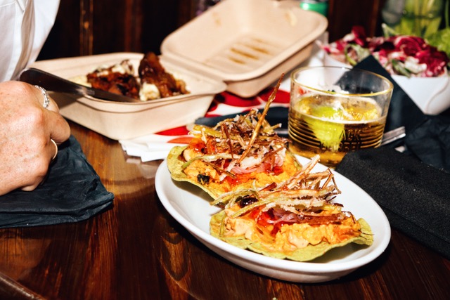 Tacos and a drink on a pub table at a Saturday Lunch Pop-Up in Skehan's